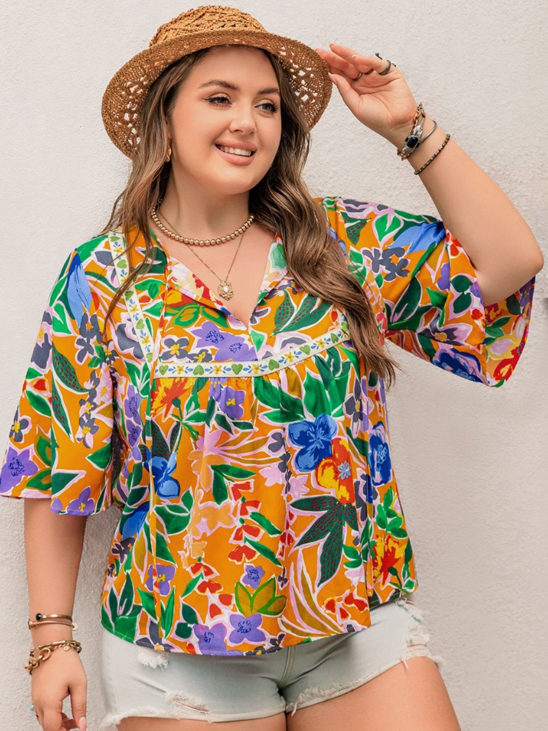 Plus Size Printed Tie Neck Half Sleeve Blouse